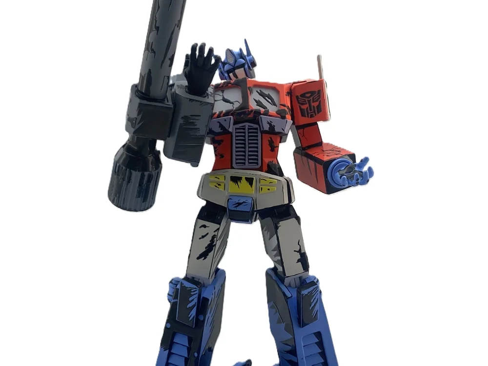 Transformers Optimus Prime with Megatron’s Arm Paperweight