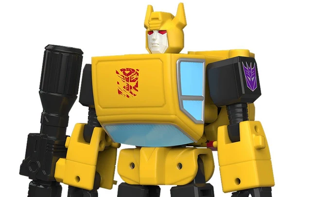 Close view of the Awakening Bumblebee figure from the chest up: red eyes in a white face, a dark red Autobot sigil on the yellow chest panel broken into shards and scratches, and a purple Decepticon sigil printed on the black cannon housing pegged to his right shoulder.
