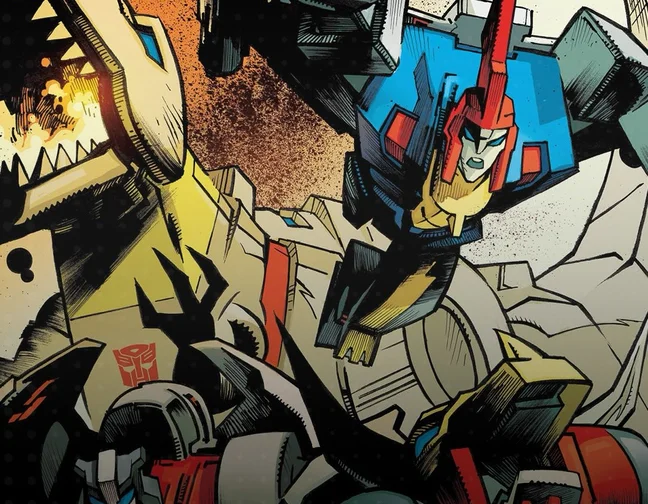 Dinobot artwork from the Transformers issue 42 announcement. A cream and yellow mechanical tyrannosaur head fills the left of the frame with its jaw open over a fire, a red, blue and yellow winged robot swoops down through the centre with its arms spread, and a grey robot carrying an Autobot insignia on its shoulder stands at the lower left among broken rubble.