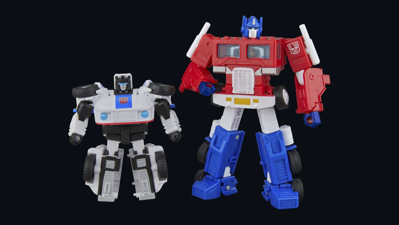 Hasbro SDCC 2026 exclusive Transformers cereal box set artwork showing G1 style Optimus Prime and Autobot Jazz with the retro cereal packaging